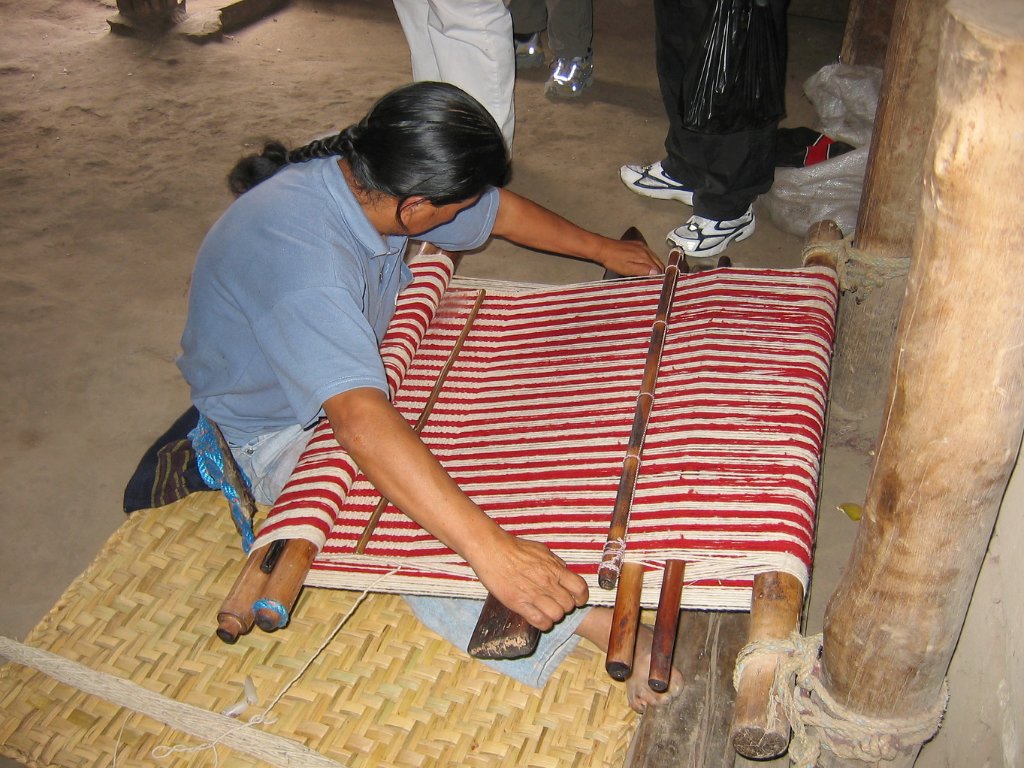 08-Weaving a cloth for clothing.jpg - Weaving a cloth for clothing